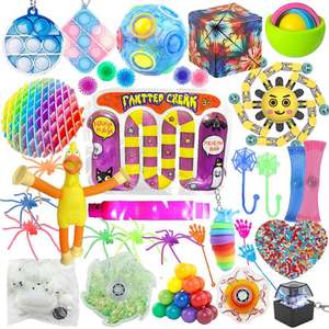 Juguetes Sensoriales Navideños: Teclado Blandito Transformable, Llaveros Giratorios, Tapas de Teclado con Logo y Bolas Sensoriales para Niños - Product Image 1