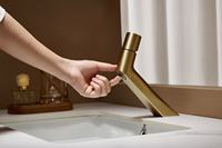 Robinet de lavabo moderne élégant et créatif en or brossé à un seul trou avec cartouche en céramique et eau chaude/froide