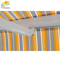 Auvent rétractable manuel en aluminium avec revêtement PVDF anti-UV imperméable A04 à fixation murale
