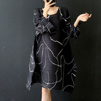 Robe longue plissée imprimée 2026 Printemps-Été Nouvelle mode Coupe ample Amincissante Élégante Robe midi plissée Miyake
