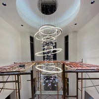 Grandes lampes suspendues modernes de style nordique Décoration personnalisée de mariage d'hôtel Lustre en or-Salon Cristal Fer Long Luxe Haut Plafond