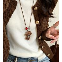 Collier long pour femme avec pendentif tête d'ours en peluche orné de diamants, mignon et unique, accessoire de chaîne pour pull