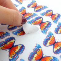 Fabricant d'étiquettes en silicone souple avec logo papillon personnalisé Autocollants d'impression par transfert de chaleur haute densité en silicone avec points en brosse