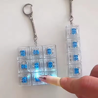 Jouets anti-stress pour clavier, porte-clés LED en cristal, gadget de décompression pour les doigts, jouet clicker anti-stress