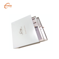 Boîte à glissière en carton avec doublure en éponge satinée, gaufrage à chaud doré, emballage rigide pour parfums, vêtements, bijoux, montres, coffrets cadeaux de luxe