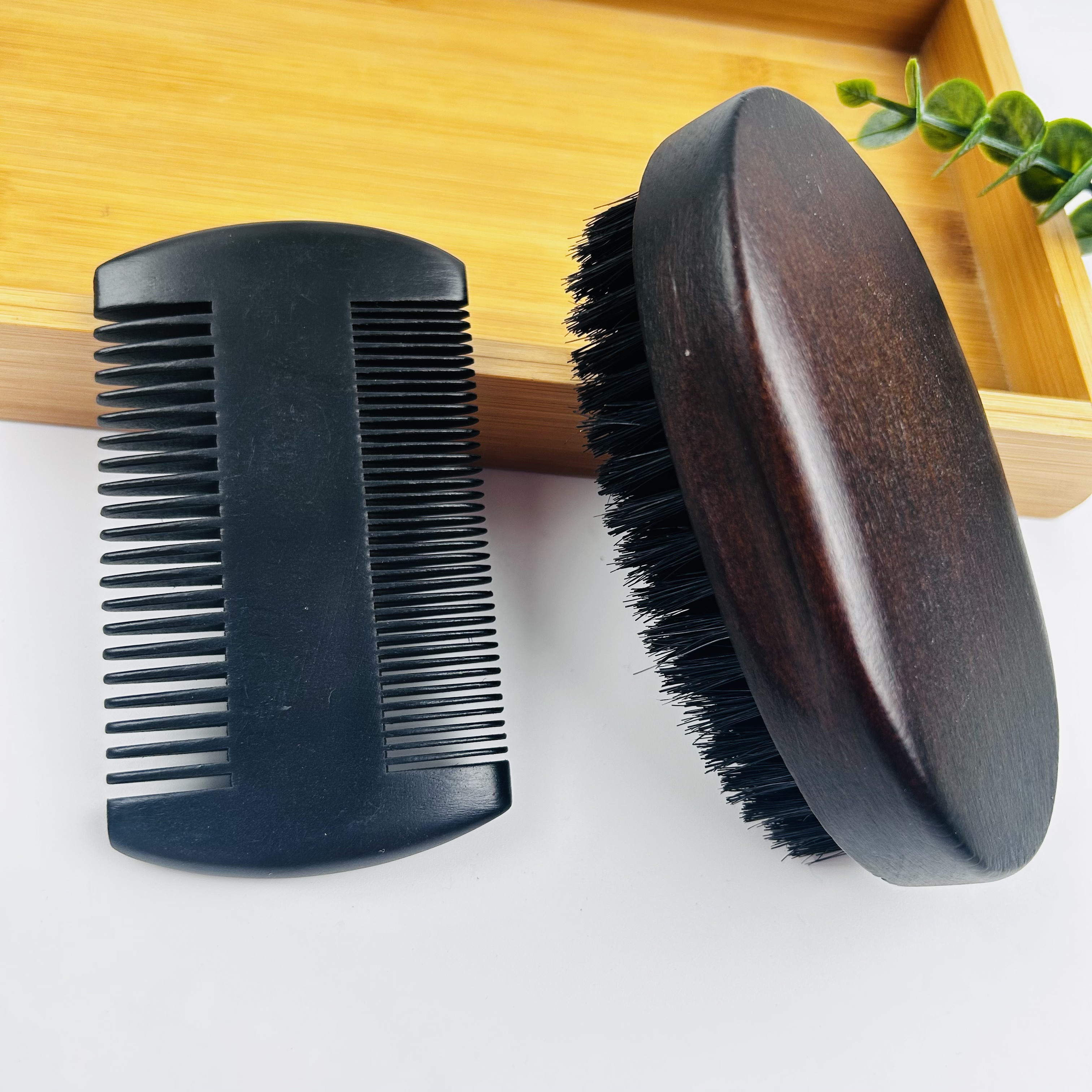Black comb + dark brown brush
