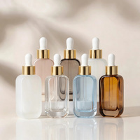 Flacon compte-gouttes en verre transparent de 50 ml à épaule plate avec logo personnalisé pour huile capillaire, sérum, gouttes pour les yeux, sérum de soin de la peau, emballage cosmétique