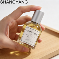 Nouvelles bouteilles de parfum en verre vides SY de 30 ml, 50 ml, 100 ml, rondes, transparentes, rechargeables, avec pulvérisateur et impression