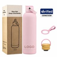 Bouteille d'eau isotherme en acier inoxydable 304 de 750 ml avec revêtement en caoutchouc doux au toucher, finition mate, et poignée portable pour l'extérieur