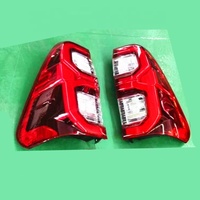 Feux arrière LED rouges/transparents/fumés JOP4X4 pour Toyota Hilux Revo 2015-2024 avec logo Hilux
