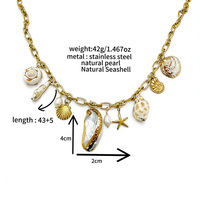 Nouveauté Muses Jewels : Ensemble collier et bracelet en acier inoxydable avec perles d'eau douce naturelles blanches et breloque coquillage style océan