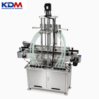 Machine de remplissage automatique de bouteilles de liquides KDM-ALF4 avec pompe à engrenages pour huiles, cosmétiques, sauces et détergents