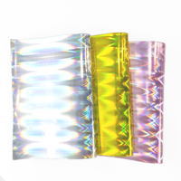 Vente en gros de faux cuir écologique et imperméable en faux cuir synthétique irisé holographique au laser pour sacs de voitures