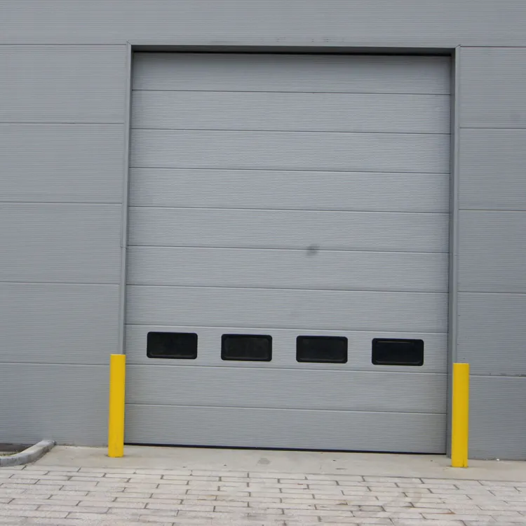 自動スライディング倉庫オーバーヘッド産業用ドアを持ち上げる産業用断面垂直工場