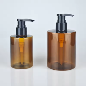 Bouteille ronde vide en plastique PET ambre bleu vert avec pompe à lotion 300ml 500ml flacon compte-gouttes d'huile essentielle pour le corps - Product Image 1