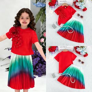 ชุดกระโปรงฤดูร้อนใหม่ปี 2026 สำหรับเด็กหญิงและเด็กเล็ก: เสื้อยืดแขนสั้นปักลายดอกไม้ 3 มิติ + กระโปรงไล่เฉดสี (ชุดสองชิ้น) - Product Image 2