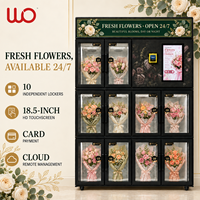 Distributeur automatique intelligent de fleurs fraîches réfrigérées à 10 compartiments avec écran tactile, paiement par carte et billets pour la vente de bouquets 24h/24 et 7j/7