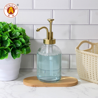 Distributeur de savon rond en verre pour comptoir commercial F29, pompe en SUS304 avec bouchon en forme de trompette et bec verseur incurvé à arche haute