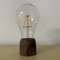 Chargeur électrique inductif sans fil Ampoule à lévitation pratique Lampe de chevet à lévitation magnétique Cadeaux personnalisés