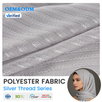 Tissu en mousseline de polyester jacquard B8 fluide et léger avec fil argenté pour robe de soirée OEM