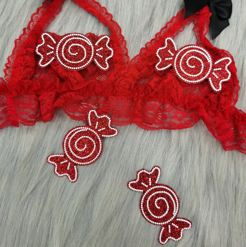 Наклейки на грудь женские в форме красных конфет, оптовая продажа, одноразовые блестящие женские сексуальные накладки на соски