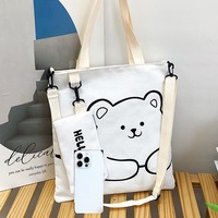 Élégante trousse à crayons en toile avec sangle et fermeture éclair, style frais et doux, sac bandoulière polyvalent pour femme, collection Hiver 2024