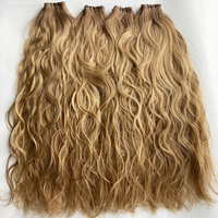 Extensions de cheveux de trame de génie bouclés invisibles de qualité supérieure à prix gratuit