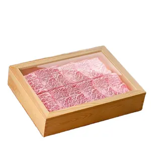 刺身と寿司の料理とプレート用の透明な蓋付きの和風木製ケース