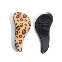Brosse à cheveux populaire à double face imprimé léopard, peigne coussin d'air à dents denses, brosse démêlante massante pour le cuir chevelu