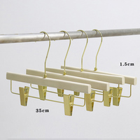 Heavy Duty personnalisé marque pas cher enfants cintre en bois femmes enfants Premium or crochet pince à manteau blanc cintres en bois pour vêtements
