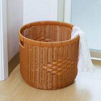 Panier à linge et corbeille de rangement rond moderne et minimaliste en PP avec poignée style rotin, hermétique, pour salle de bain et jouets
