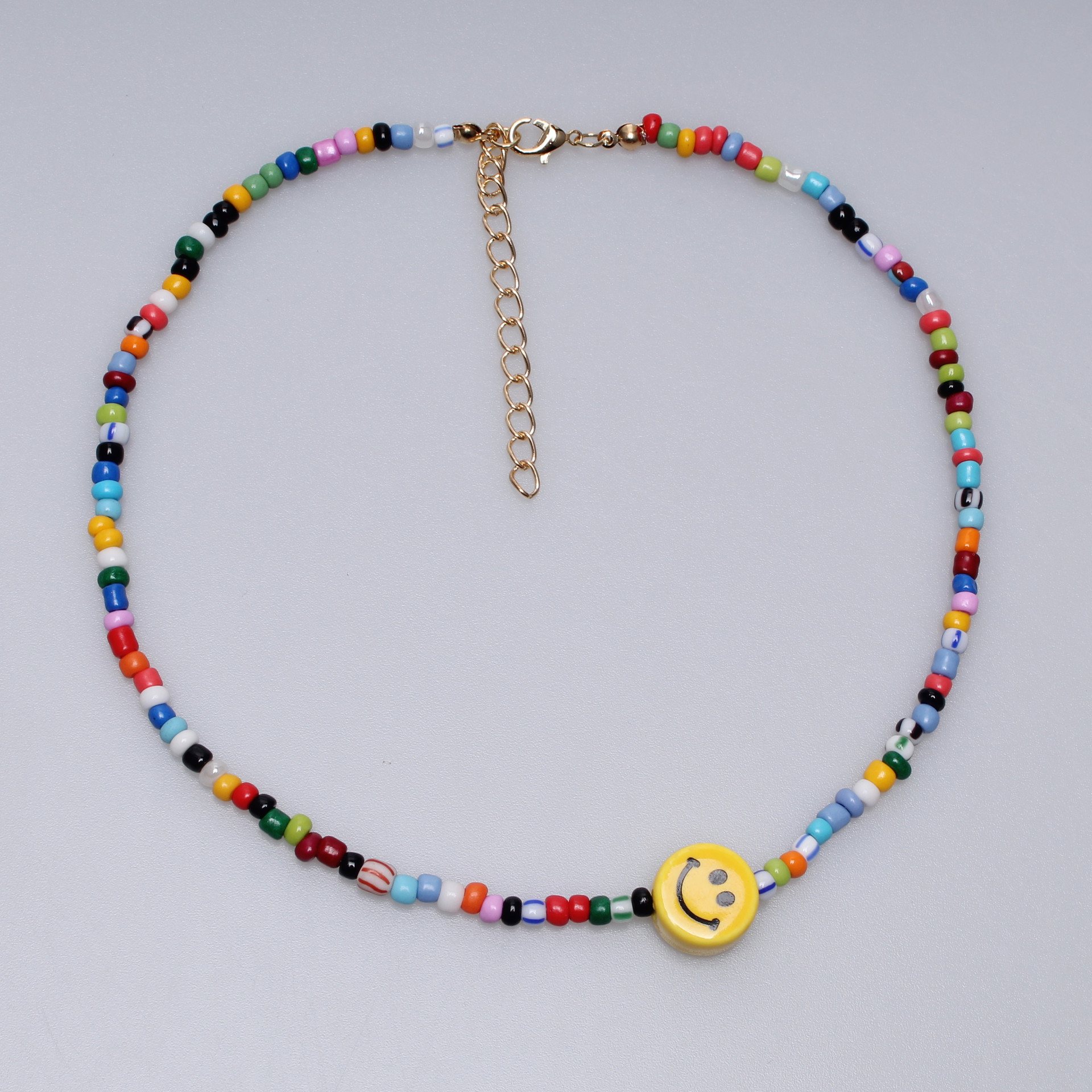 collar de cara sonriente
