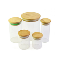 Paquets de puissance de fleur de 1/8oz couvercle d'aspiration de joint d'anneau en Silicone 3.5 grammes-200 compte pots en verre de 2oz avec couvercles en bois