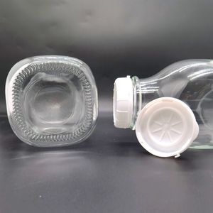 32 ออนซ์ ขวดแก้วใสทรงเหลี่ยมขนาด 1000 มล. <span class=keywords><strong>1</strong></span> ลิตร พร้อมฝาพลาสติกสีขาวแบบล็อคป้องกันการแกะขนาด 48 มม. รุ่น 48-Snap - Product Image 5