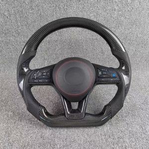 Volant en fibre de carbone pour <span class=keywords><strong>Nissan</strong></span> <span class=keywords><strong>GT</strong></span>-R R35 - Surpiqûres <span class=keywords><strong>orange</strong></span> et design léger - Product Image 4