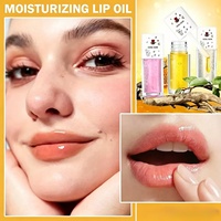 Huile à lèvres au miel en gros OEM ODM, étiquette privée personnalisée, hydratante, nourrissante, sérum brillant pour les lèvres, soin des lèvres, beauté