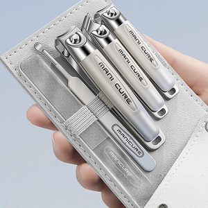 Kit de coupe-ongles portable en acier inoxydable, lime à ongles, cure-oreilles, outils de toilettage de voyage pour femmes et hommes - Product Image 1