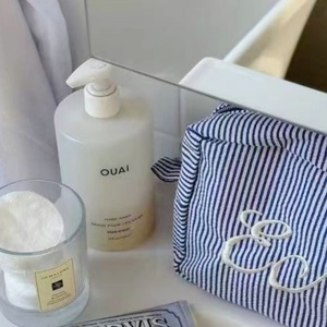 กระเป๋าเครื่องสำอางคุณภาพสูง ลายทาง ผ้าแคนวาสลายแจ็คการ์ด กระเป๋าใส่เครื่องสำอางปักโลโก้ - Product Image 1