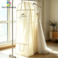 Sac de rangement pliable pour robe de mariée orange avec fermeture éclair, sac de rangement pour costume avec texte noir simple et logo personnalisé