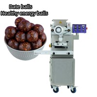 Machine à rouler les boules de dattes Ligne de production de boules de dattes à la noix de coco Machine à diviser la pâte pour les petites entreprises