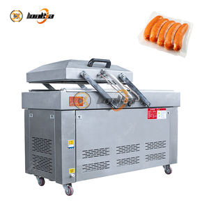 Machine de mise sous vide automatique à double chambre avec deux chambres indépendantes pour un travail continu - Product Image 1