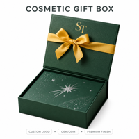 Boîte cadeau cosmétique écologique vert émeraude avec fermeture magnétique, ruban en satin doré et nœud, intérieur en similicuir motif étoilé céleste