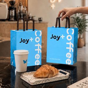 ถุงกระดาษคราฟท์แบบมีหูหิ้วสำหรับใส่กาแฟหรืออาหารแบบนำกลับบ้าน พิมพ์โลโก้ได้ตามต้องการ ย่อยสลายได้ รีไซเคิลได้ - Product Image 4