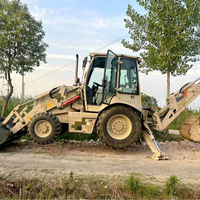Chargeuse-pelleteuse d'occasion 8,2t avec bras de terrassement arrière, prête pour les chantiers de construction à l'étranger