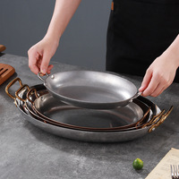 Disque elliptique binaural en acier inoxydable Assiette à steak et poisson de l'Ouest Plats et casseroles de fruits de mer espagnols