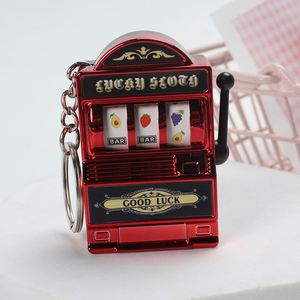 Mini porte-clés machine à sous, finition métallique dorée, avec manivelle fonctionnelle et rouleaux, souvenir de casino, accessoire, cadeau de fête, cadeau pour collectionneurs - Product Image 6