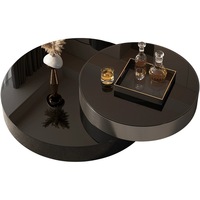 Table basse moderne de style italien minimaliste, luxe léger, en verre noir avec structure métallique et fonction rotative pour salon