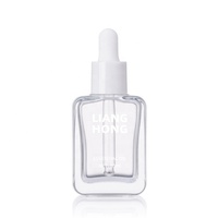 Kemasan perawatan kulit kosmetik 30ml persegi bening tepi melengkung botol tetes kaca Serum minyak esensial rambut mewah dengan tetes mata
