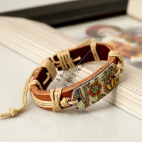 Bracelet en corde tressée vintage fait main, bracelet en cuir de vachette avec bijou en acier inoxydable en forme de fleur