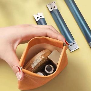 ผลิตกระเป๋าใบเล็ก กระเป๋าเครื่องสำอางหนัง กระเป๋าถือ พร้อมสกรีนโลโก้ตามสั่ง - Product Image 3